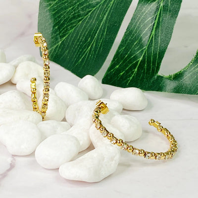 Boucles d'oreilles créoles avec perle et strass