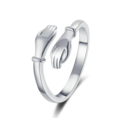 Anillo de moda ajustable con manos románticas abrazándose