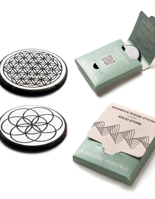 Cargar imagen en el visor de la galería, Pegatinas de Shungita para Protección de Gadgets de Teléfono Móvil 2 uds Grabado Flor de la Vida y Semilla de la Vida | Pegatinas Redondas para Protección de Gadgets Bloqueadores | Placas de Piedra de Shungita Pulida | Chip de Carbón Bodywell S576
