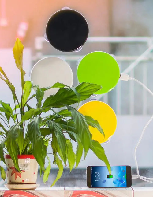 Load image into Gallery viewer, Solar-Powered Mobile Charger with Suction Cup Mount
