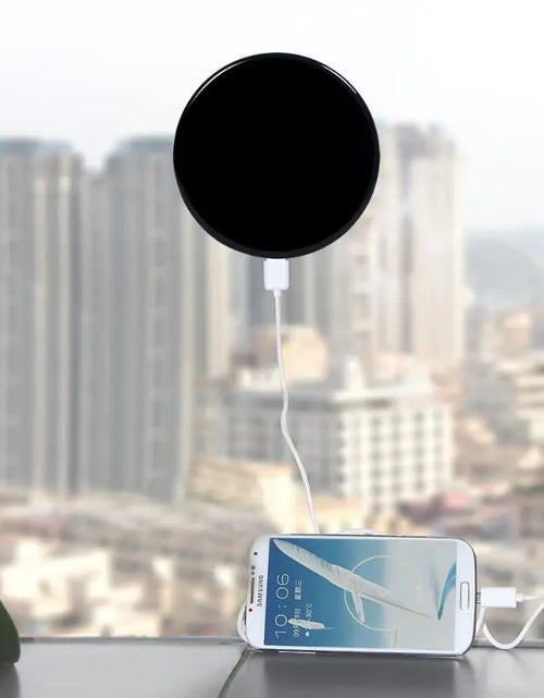 Load image into Gallery viewer, Solar-Powered Mobile Charger with Suction Cup Mount
