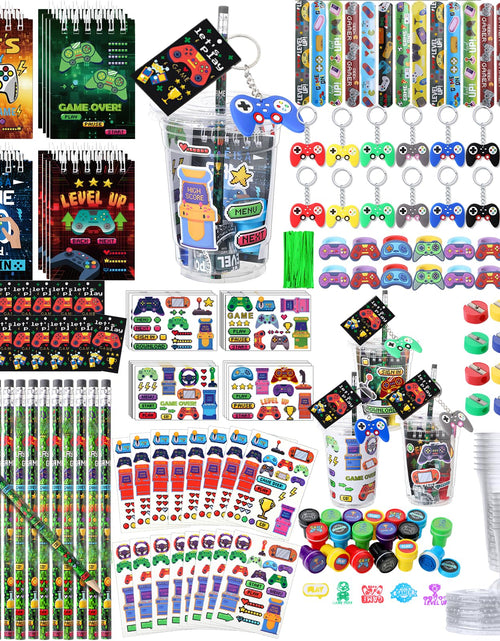 Load image into Gallery viewer, RoundFunny 177 Pcs Video Game Party Favors Drinking Cups Notebook Pencils Sharpener Keychain Slap Bracelets Ring Stamp DIY Sticker Tattoo Sticker Tag Twist Tie for Boy Kid Birthday Gamer Reward Gift
