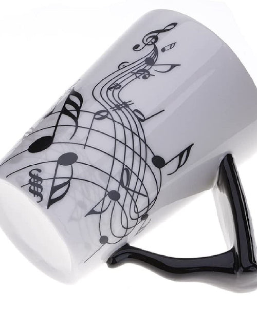 Cargar imagen en el visor de la galería, Somswcpass Taza de café de cerámica con diseño de notas musicales de 13.5 oz con asa 3D, taza para beber agua, té, cacao, tazas de notas musicales novedosas para profesores de música, regalo de cumpleaños (piano negro)
