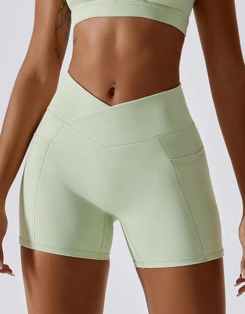Load image into Gallery viewer, Women&#39;s Cross Waist Running Fitness Shorts
